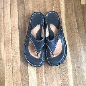 BORN slip on sandals.